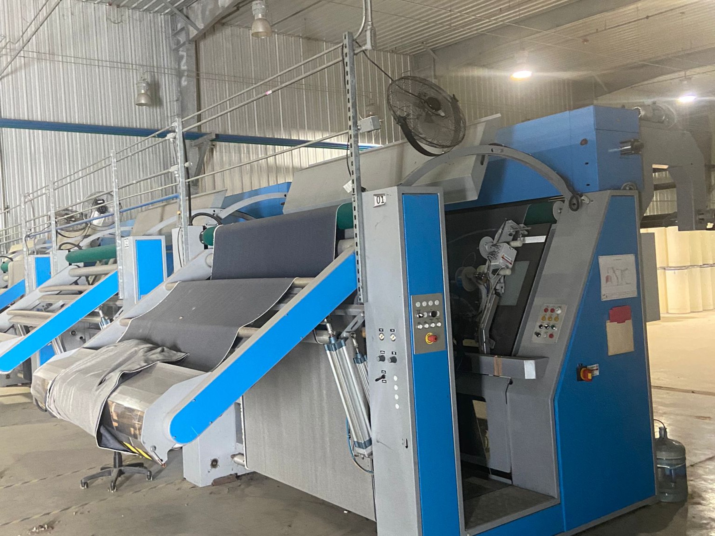(4) Testa Tensionless Inspection Machines and (1) Testa Automatic Cutting and Packaging Machine