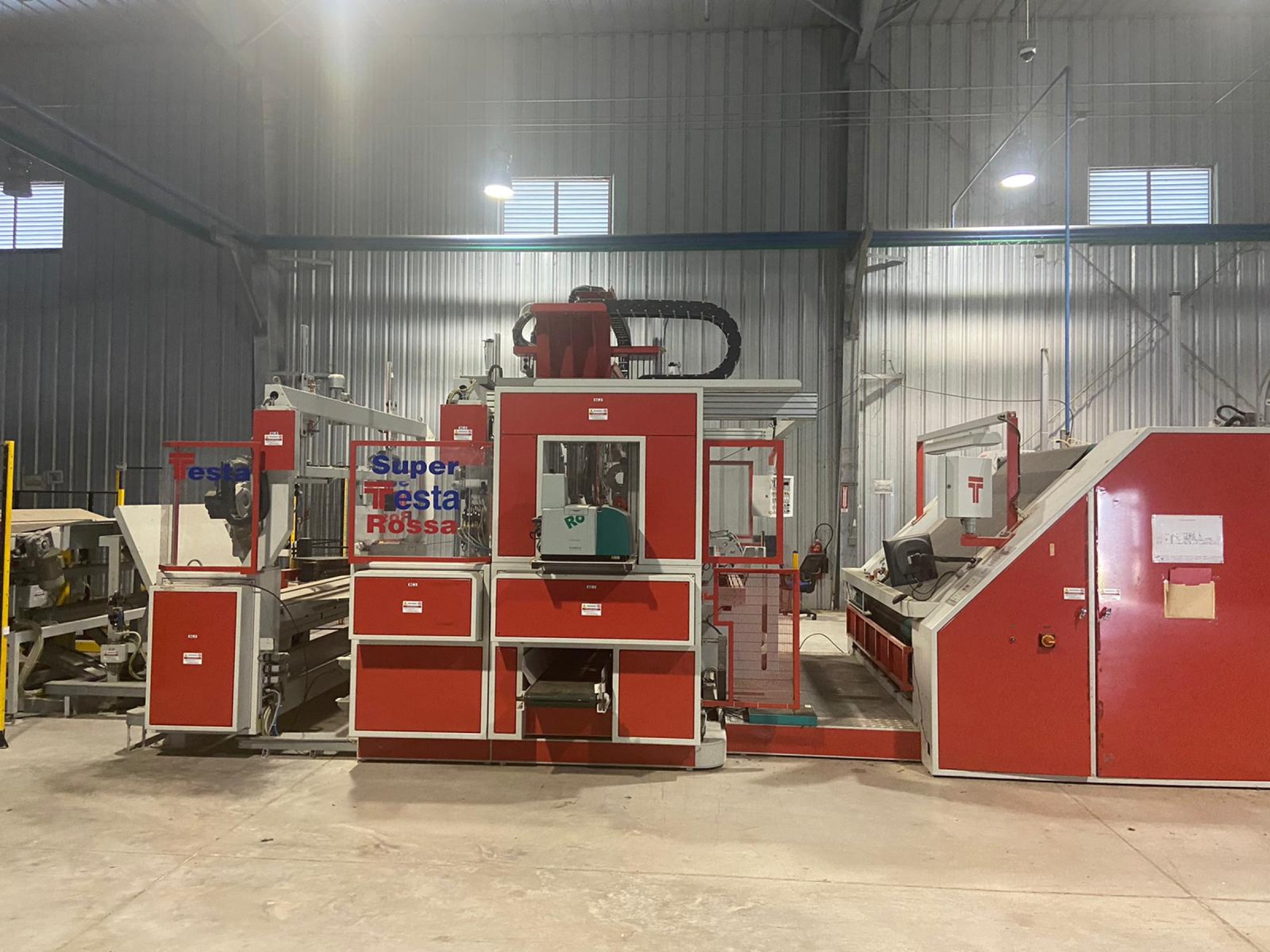 (4) Testa Tensionless Inspection Machines and (1) Testa Automatic Cutting and Packaging Machine