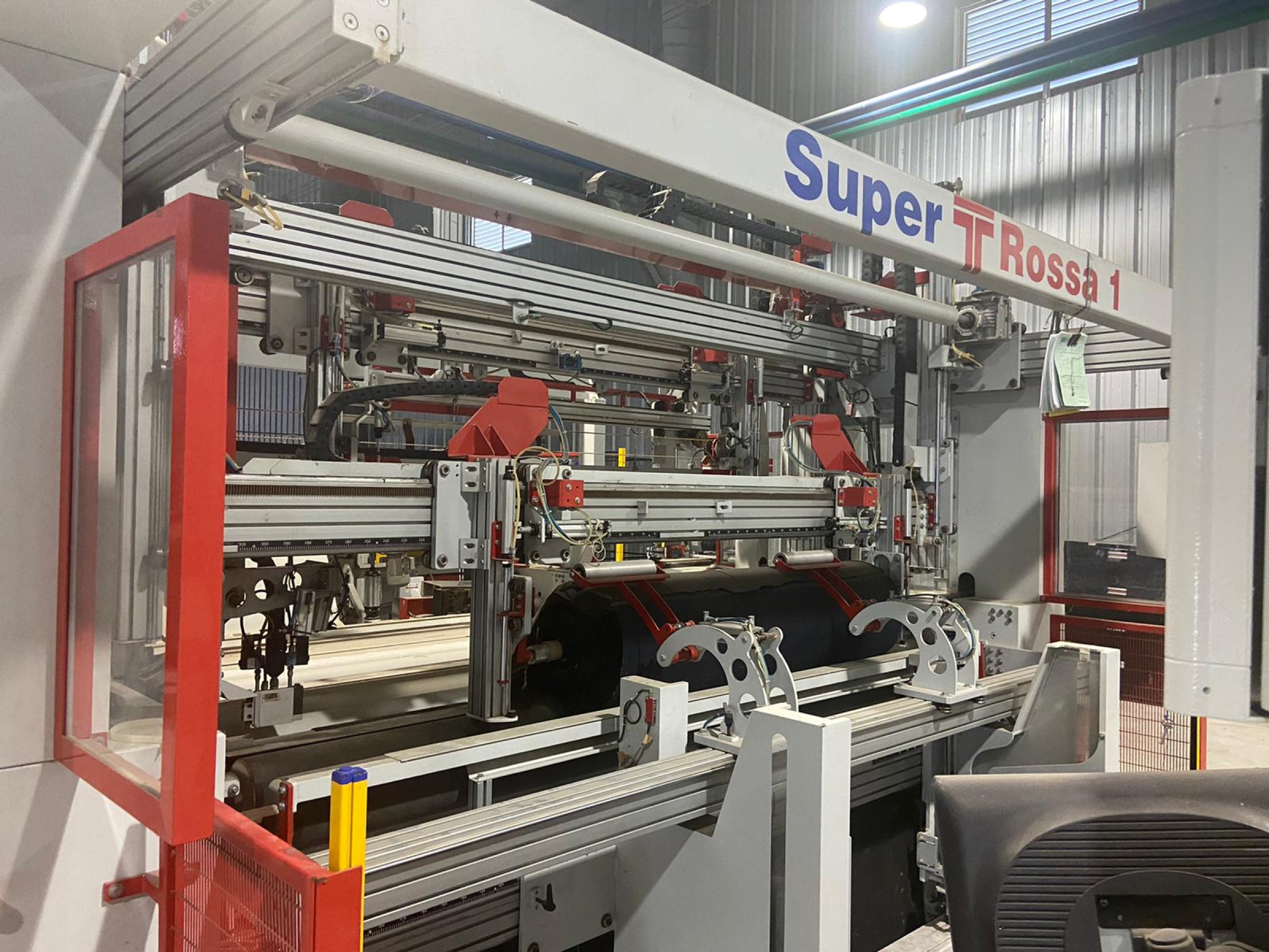 (4) Testa Tensionless Inspection Machines and (1) Testa Automatic Cutting and Packaging Machine